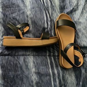 Black small wedge sandals in a size 6 1/2. Only worn a couple of times